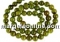Natural olive grossular garnet, round, 5.2mm